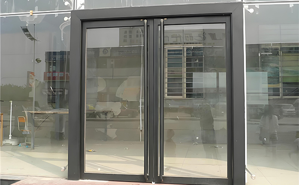 甘泉玻璃地弹门